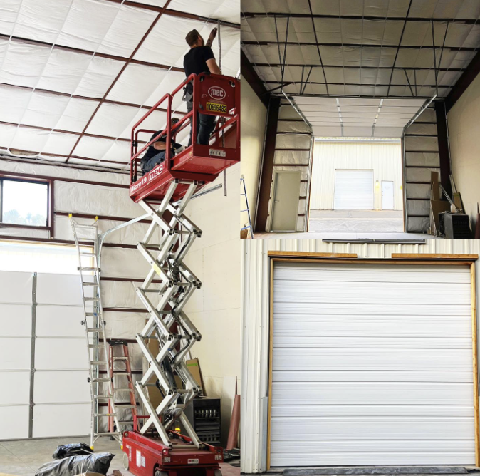 Installing insulation and doors in building interior.
